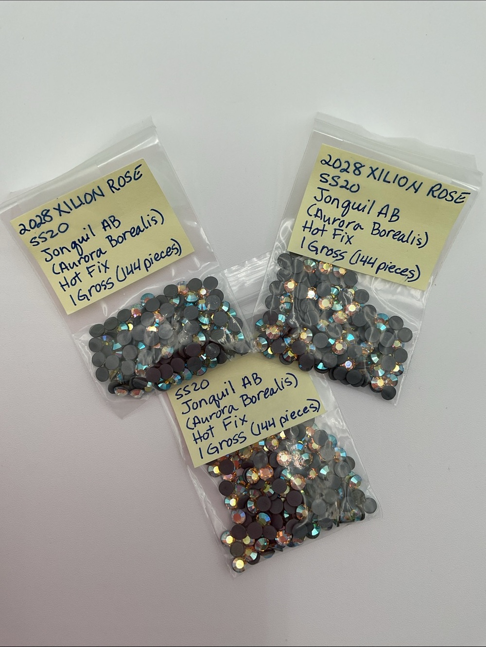 Swarovski • Color: Jonquil Aurora Borealis, 2028 XILION Rose Hotfix Rhinestones